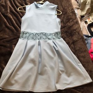 Baby blue, flowy midlength summer dress.